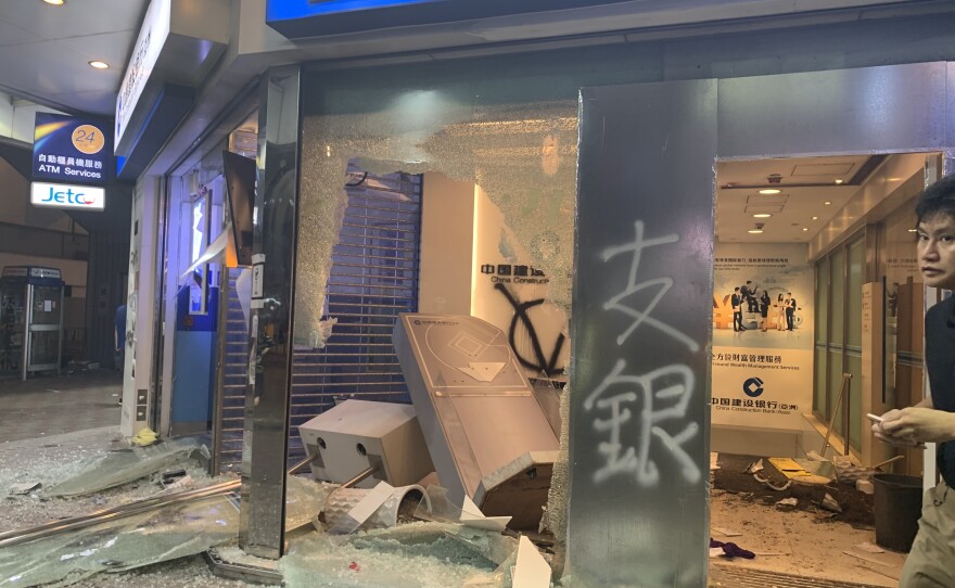 A smashed China construction bank branch in Hong Kong. Protesters have been targeting mainland Chinese state firms and pro-Beijing businesses.