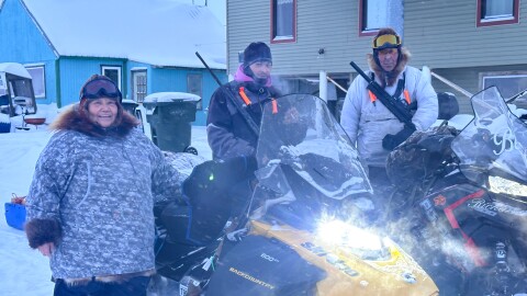 Aucha Kameroff, Arthur Richards Sr. and Raymond Brown Jr. pose for a photo in Kotzebue on Feb. 12