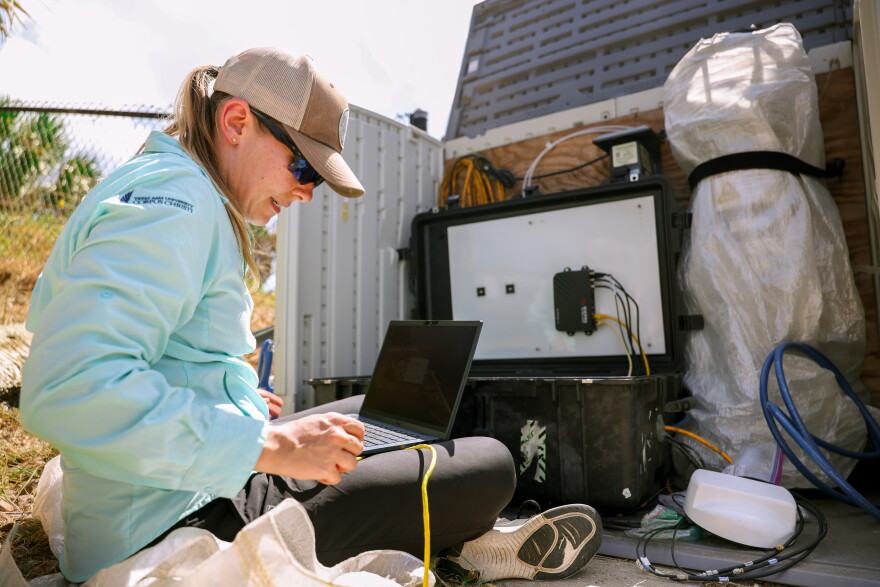 Dr. Laura Beecraft, Assistant Research Scientist at Harte Research Institute, works on an imaging flowcytobot. The institute works with Texas Parks and Wildlife Department and others to early detect, and notify others about, harmful algal bloom like red tide.