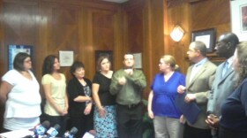 Members of Deaf Adult Services gathered in Mayor Brown's office