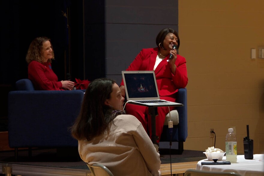 Winston (right) answered questions submitted by attendees Tuesday at Fairview.