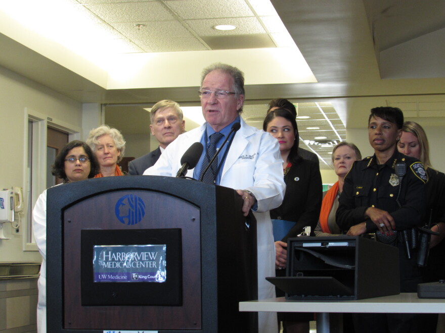 Dr. Fred Rivara demonstrated how quickly a lockbox can be opened to give access to guns stored there. 