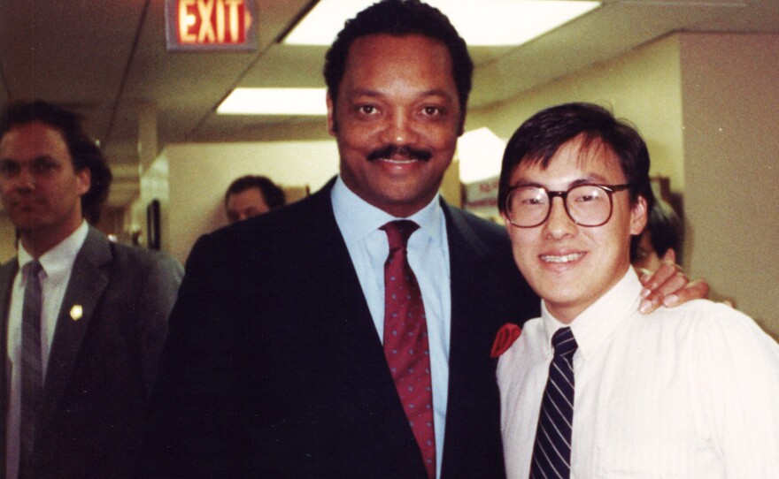 A young Mark Keam with his political hero, the Rev. Jesse Jackson, when Jackson visited the Democratic National Committee headquarters during his 1988 bid for the presidency.
