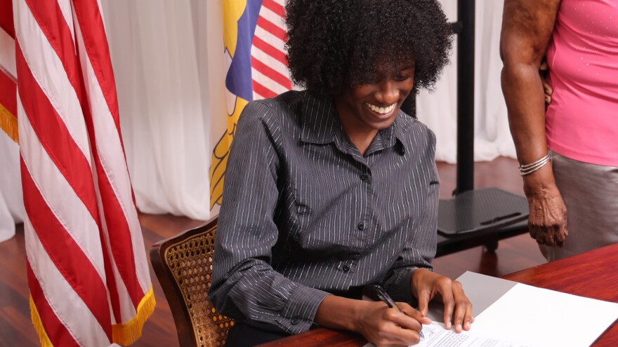 Michelle Smith Signing Papers