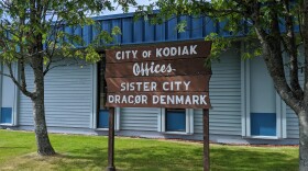 The City of Kodiak sign at the Kodiak Island Borough Building. (Photo by Kavitha George/KMXT)