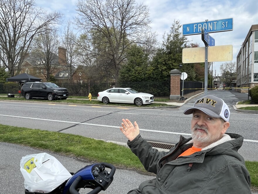 Harrisburg resident Michael Richards chats with a WVIA reporter across the street from the Governor's Residence on April 14, 2025, the day after the residence was firebombed with Gov. Josh Shapiro and his family asleep inside. The Shapiros escaped safely.