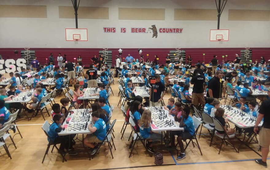 The top winners from each age division received trophies. Each participant received a swag bag with a chess medal, chess piece, and a participation certificate.