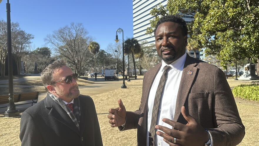 Republican South Carolina Rep. Brandon Cox from Goose Creek, left, and Democratic state Rep. Jermaine Johnson of Columbia, right, talk on the proposed site for a statue of Reconstruction hero Robert Smalls on Wednesday, Jan. 8, 2025, in Columbia, S.C.