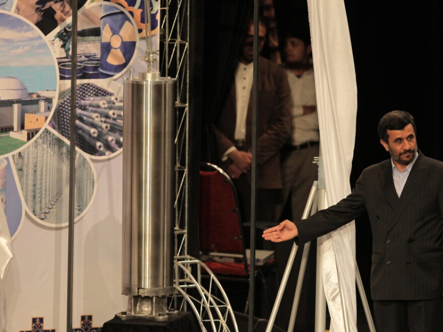 Iranian President Mahmoud Ahmadinejad unveils a sample of the third generation centrifuge for uranium enrichment during a ceremony in Tehran on April 9, 2010. Iran says its nuclear ambitions are peaceful.