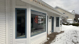A building owned by Apollos Properties overlooking Leland’s historic Fishtown sits empty pending a federal lawsuit over Youth for Christ’s desire to open a youth ministry in the commercially zoned business district.
