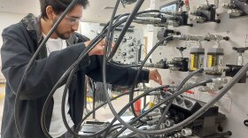 Dylan Ruiz, a 17-year-old senior at Legacy High School in Midland, works through a training scenario on preventing oil leaks during his class on pumps, compressors and mechanical drives at Midland College’s Petroleum Energy Program.