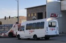 Buses pull onto Harrison Street as they depart the CityLink transit center in downtown Peoria.  