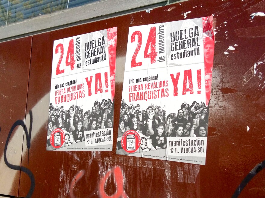 Old posters on the wall of a school in San Cristóbal call on students to participate in a strike last November. The slogan warns, "Get out of the way, Francoists!" Spain's experience of decades of dictatorship helps protect against an embrace of the right wing now. Calling someone a franquista — a follower of the late, right-wing dictator Francisco Franco — remains an insult.