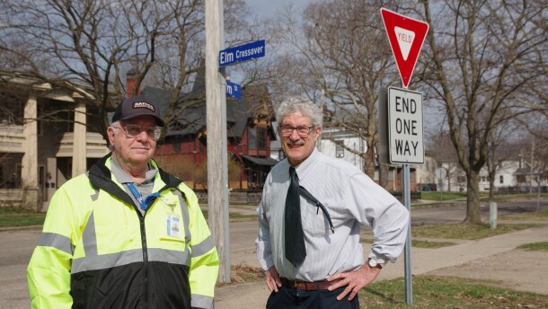 Kalamazoo Traffic Engineer Dennis Randolph and Kalamazoo resident James Voigt stand at the instersection of Elm Crossover and Elm Street