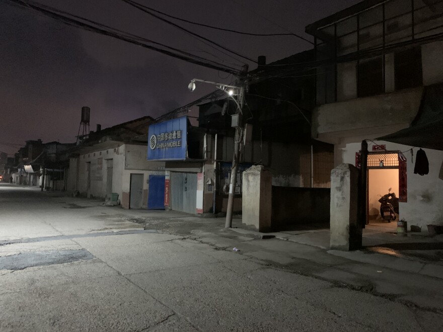 Streets were empty at 8 p.m. on Monday in a village in Jiangxi province even before an unofficial quarantine. Many families were at home having dinner, and the weather was freezing.