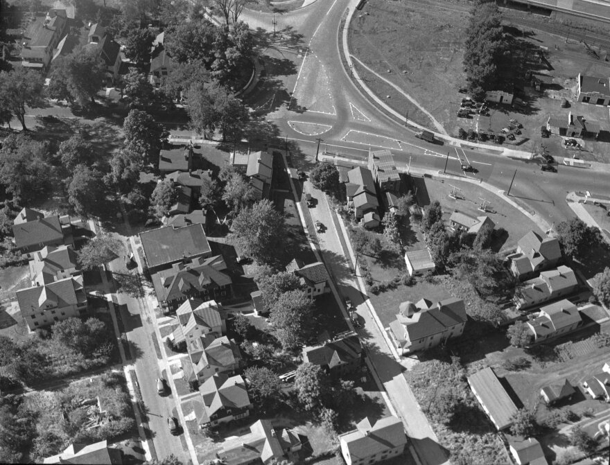 An aerial view of the intersection of Clarissa Street, Mount Hope Avenue and River Boulevard, featuring the traffic islands, dated 1939.
