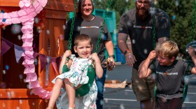 Springfield child Lexi enjoys playtime with her siblings and parents on play equipment donated by a Springfield, Mo. company in August, 2026.
