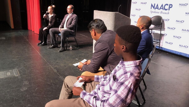 Callie Gee (left) answers a question at an October 1 NAACP forum for Spokane County auditor candidates. Gee, a Democrat, is running against Republican Michael Cathcart, seated to her left. The panelists asking the questions were Jorge Guerrero (brown suit), Kingsley Ugorji (plaid shirt) and Quentin Baker (blue suit).