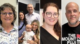Four vertical images from left to right show the following people posing for the camera: First -- a woman in her 70s, with shoulder-length grey hair. She's wearing glasses and a floral button-up shirt. Second -- a family  of 50-something grandparents (a brunette woman and a grey short-haired man the pair each wear patterned shirts.) They are standing behind a 25-year-old blonde long-haired woman sitting on a chair. She's holding a 6-month-old bald infant. The baby is smiling and wearing a white shirt that's embroidered with the name 'Sonny'. Third -- a 30-year-old woman, with long brown hair, pulled back. She's wearing glasses, and has a silver stud piercing under her lip; Fourth -- a 55-year-old bald man with a grey goatee. He's wearing a black T-shirt with a red-and-white logo, and white lettering that reads 'The Mount Fuji.'