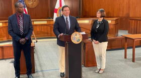 Gov. Ron DeSantis, flanked by Surgeon General Joseph Ladapo and state Rep. Cyndi Stevenson, announced Florida will challenge federal vaccination requirements.