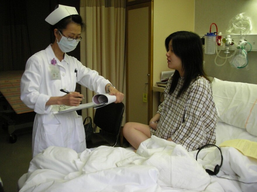 Nurse doing final checklist