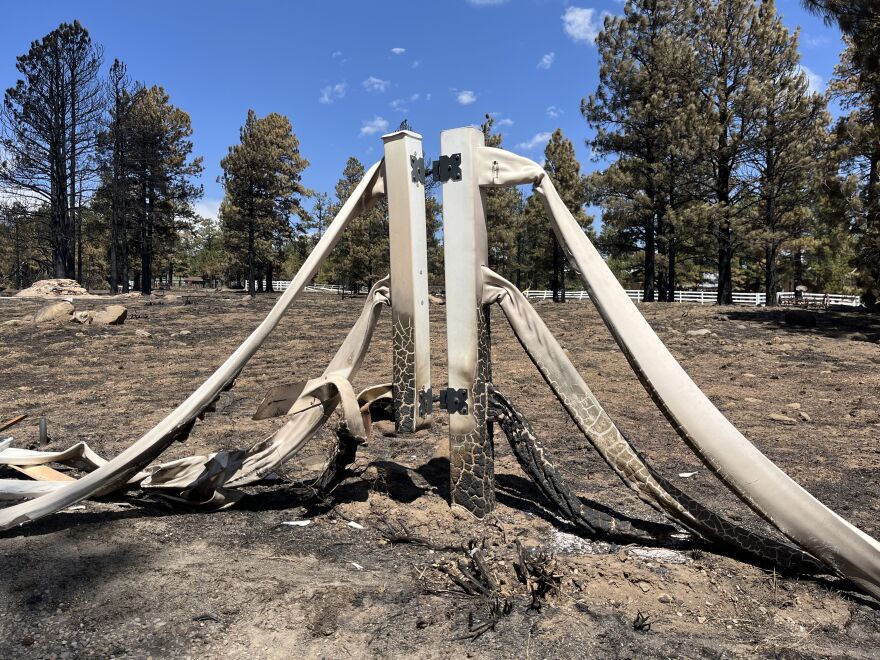 A vinyl fence on private property in the Timberline area as seen on April 28, 2022 was almost completely melted during the Tunnel Fire.