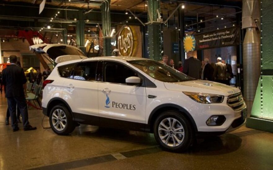 A Peoples Gas vehicle is equipped with an advanced leak detection system to find places where methane is escaping from pipelines. (Sabrina Bodon/WESA)