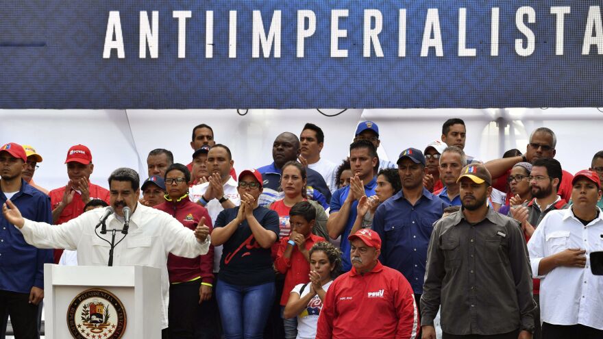 Venezuela's President Nicolás Maduro speaks to supporters during a rally at the Miraflores Presidential Palace in Caracas, Venezuela.