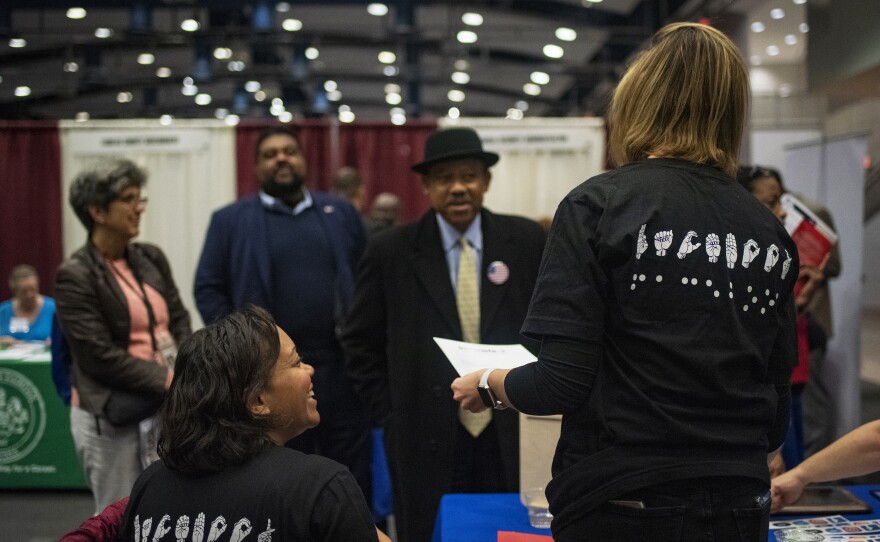 Job candidates with disabilities attend <em>Careers & the Disabled </em>magazine's career expo hosted by Equal Opportunity Publications in Washington, D.C.