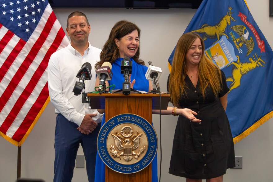 Kristen McDonald-Rivet (D-Bay Citys is joined by Chelsea Fitzgerald of Saginaw and Justin Pommerville with UA Local 85, as she holds a press conference for a recently introduced anti-corruption bill in Saginaw, Michigan, on Friday, July 10, 2026.