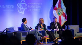 Matt Cimaglia, left, founder of Quantum Coast Capital, moderates a discussion with Palm Beach State College President Ava Parker and Florida Commerce Secretary Alex Kelly at last year’s Quantum Beach conference in West Palm Beach.