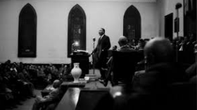 Dr. Martin Luther King, Jr. delivering a speech at White Rock Baptist church in 1960.