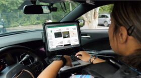 A police officer uses the Flock Safety license plate reader system. Since 2016, the Granite State has had one of the strictest laws in the country regulating and limiting such readers. (Photo courtesy of Flock Safety)