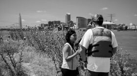 Science reporter Eli Chen interviewing on location.