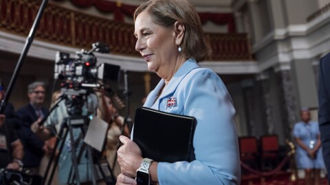 Newly-sworn Sen. Darline Graham, R-S.C., sister of Lindsey Graham, walks past cameras as she leaves the Old Senate Chamber following a cermonial oath of office ceremony allowing her to serve as her late brother's temporary replacement, at the Capitol in Washington, Tuesday, July 14, 2026, (AP Photo/J. Scott Applewhite)