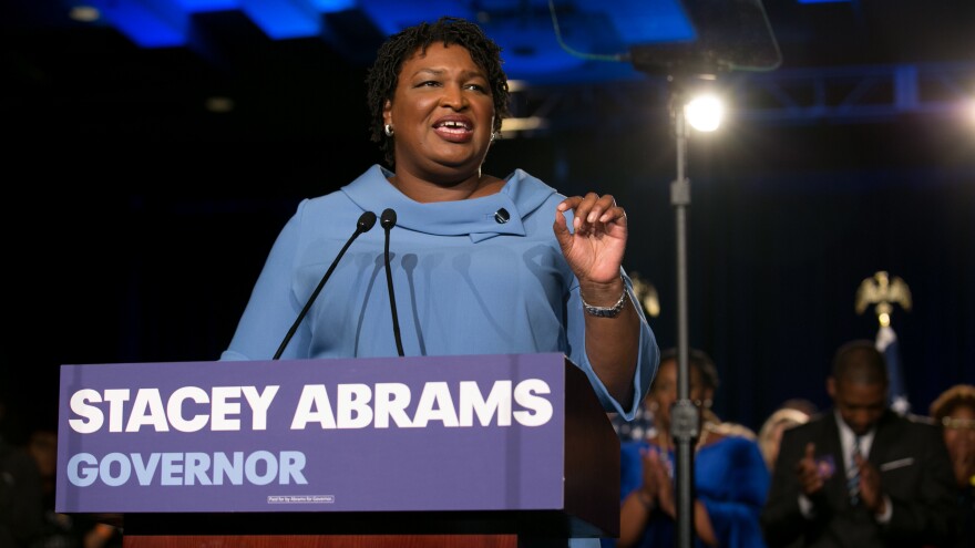 Democratic gubernatorial candidate Stacey Abrams addresses supporters at an election watch party on Tuesday. Abrams has not conceded to her Republican opponent, Brian Kemp, contending there are thousands of absentee and provisional ballots yet to be counted.
