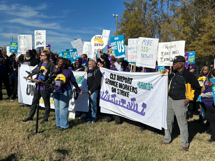 Airport workers on strike gathered at Charlotte Douglas International Airport on Monday, Nov. 25, 2024.