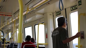 A passenger on the Honolulu rail, Skyline, on Oct. 16, 2025.