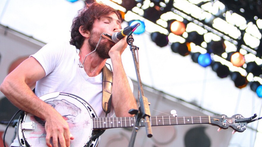 The lead singer for the Avett Brothers band, performing on stage