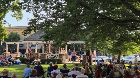 Candidates Jered Taylor and Terry Bible took turns addressing the crowd on the Ozark courthouse lawn during a forum put on by the Christian County Headliner News.