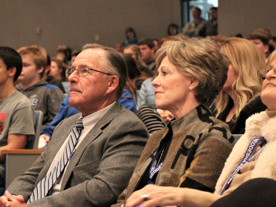 Ben Cutler (left) grew up in Neodesha and went on to a profitable career in finance and insurance.