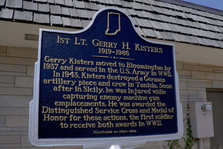 A sign outside of the airport detailing Gerry Kisters life.