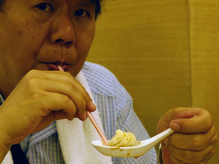 Looks like a good way to eat a soup dumpling, but it's only a straw man.