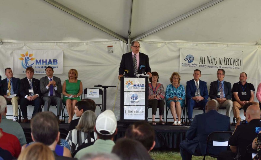 Mike Carpenter at the podium for the opening of the new recovery center