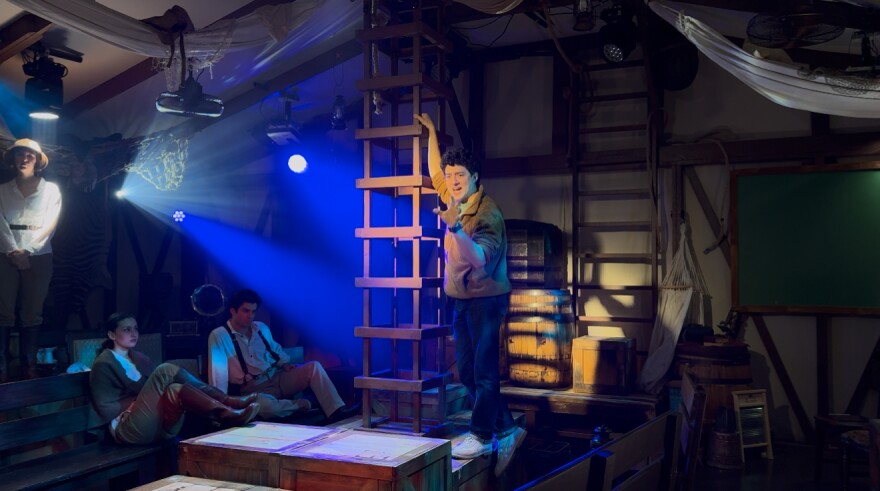 Giancarlo Rodaz directing a scene from “Disney’s Tarzan” at Area Stage.