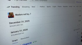FILE - The Polymarket prediction market website is displayed on a computer screen, Jan. 11, 2026, in New York. (AP Photo/Wyatte Grantham-Philips, File)