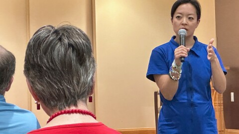 Francesca Hong, a Democratic socialist candidate for Wisconsin governor, speaks to voters at a retirement home, Tuesday, July 7, 2026, in Madison, Wis. (AP Photo/Scott Bauer)