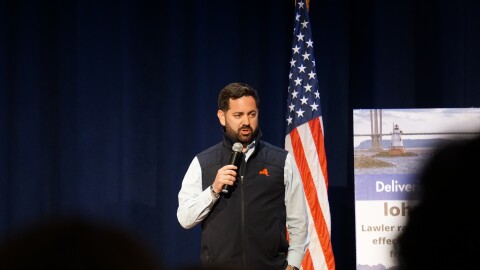 New York Congressman Mike Lawler speaking at a town hall at Mahopac High School. 