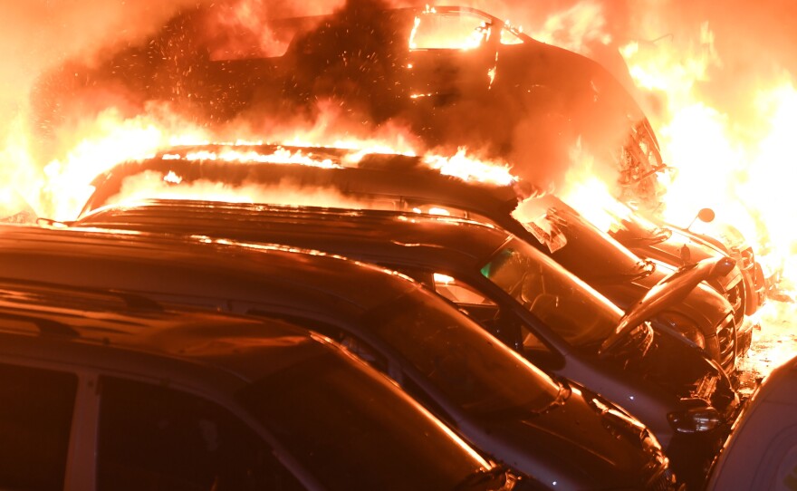 Vehicles burn in Sokcho, South Korea, part of the damage from the worst wildfires the country has seen in years.