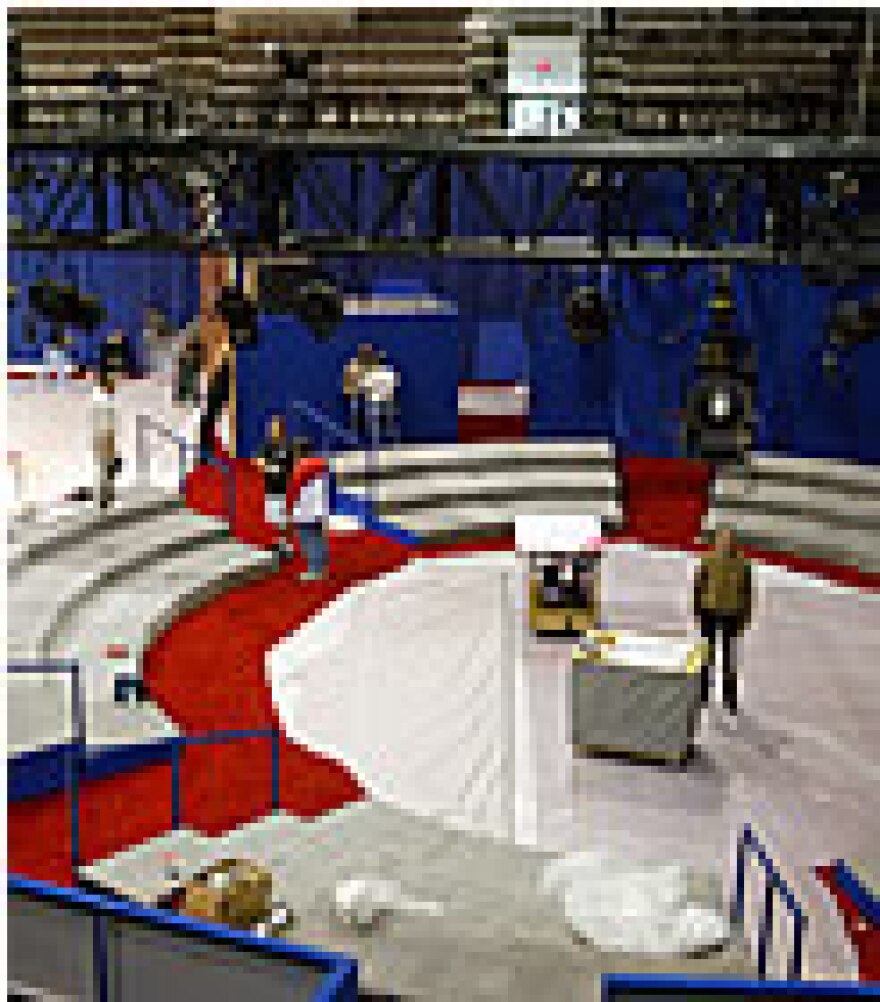 Workers on Thursday were putting together the hall for Friday's debate (UPI Photo/Bill Greenblatt)